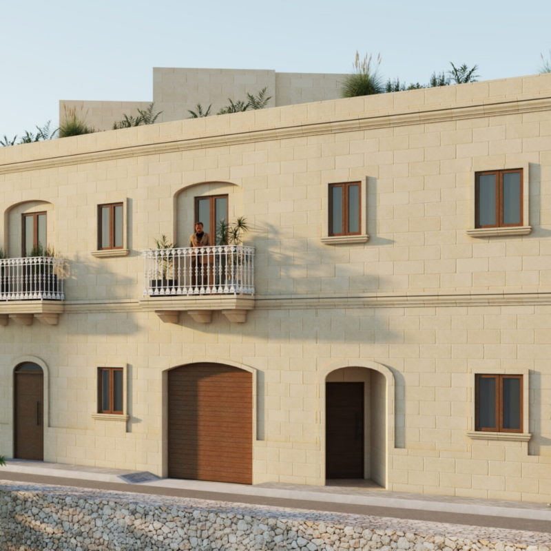 Traditional UCA townhouse facade at Ta’ Ċenċ Houses in Sannat