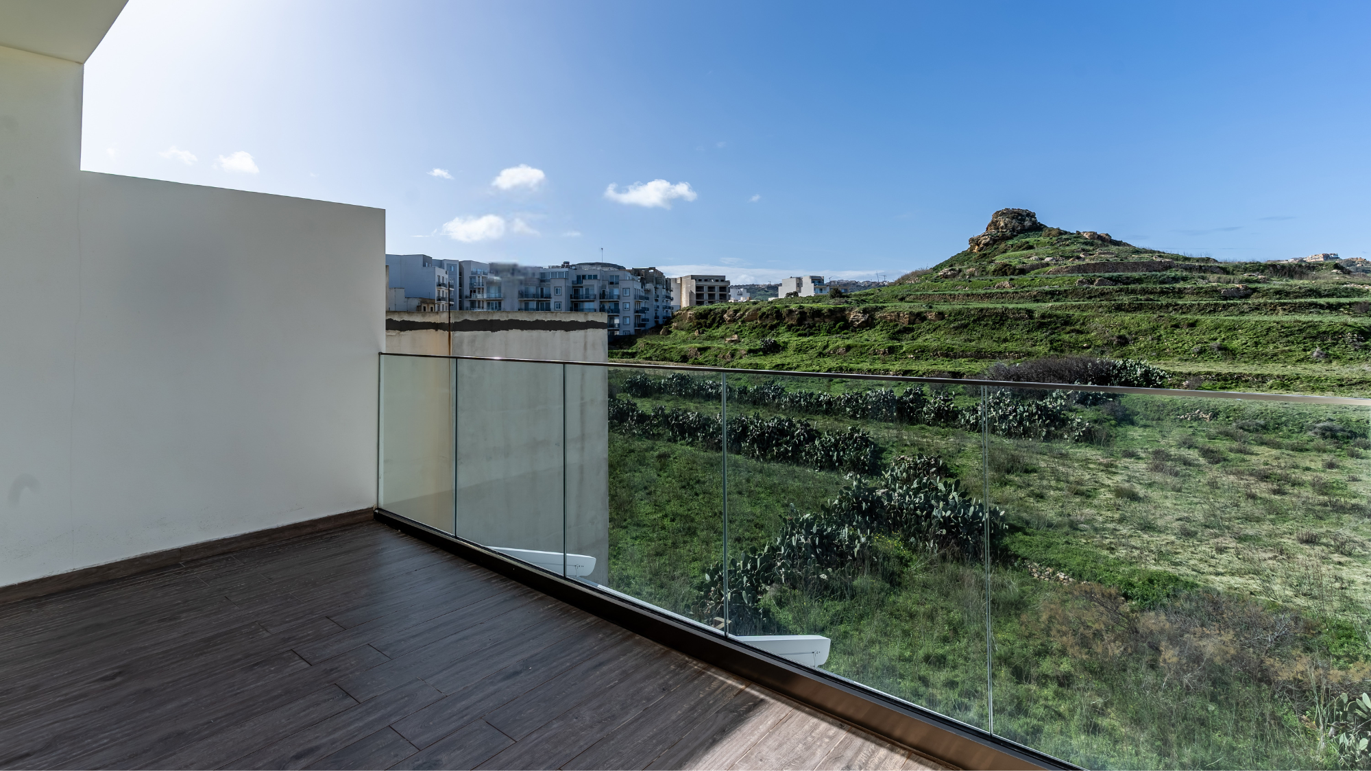 Private terrace with country views at Elzan Marsalforn apartment in Gozo